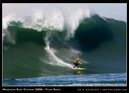 Tyler Smith drops in on a monster wave at Mavericks Surf Contest 2008 photo by Jim M. Goldstein