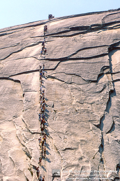 Hikers Climbing the Cables on Half Dome - Yosemite, California  (zoom)