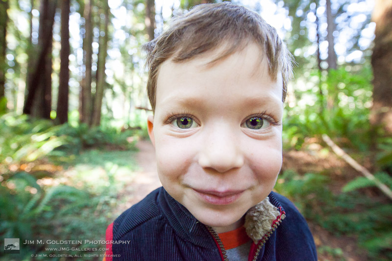 Blake smiling under the Redwood Trees