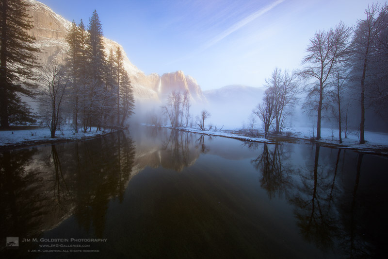 Morning light on Yosemite Falls amidst rising winter fog - Yosemite National Park