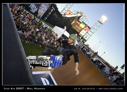 Neil Hendrix grinds the rail on the vert ramp at Icer Air 2007 sports photo by Jim M. Goldstein 