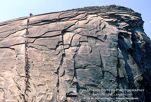 Hikers Climbing the Cables on Half Dome - Yosemite, California