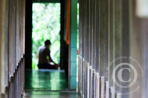 A Guide Waits Out The Rain at Sirena Biological Station in Corcovado National Park, Costa Rica